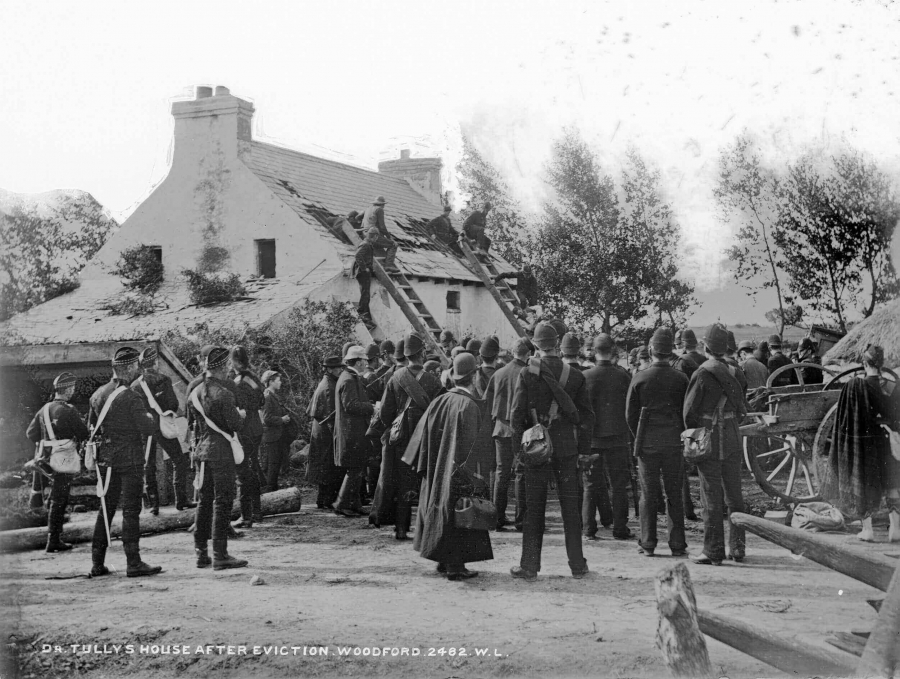 Constables surround the home of boatbuilder Francis Tully on land owned by the Marquis of Clanricarde at Woodford, County Galway.