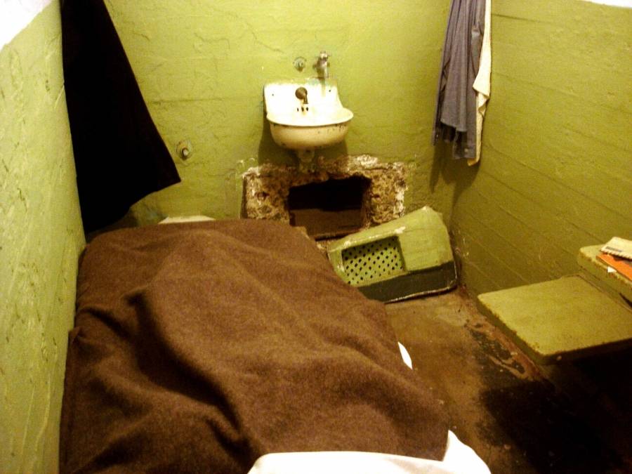 Escapee's prison cell, with widened vent opening beneath the sink.